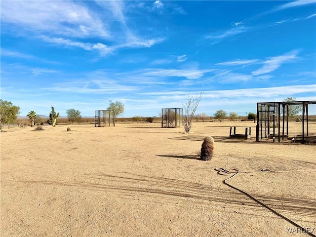 view of yard with a rural view