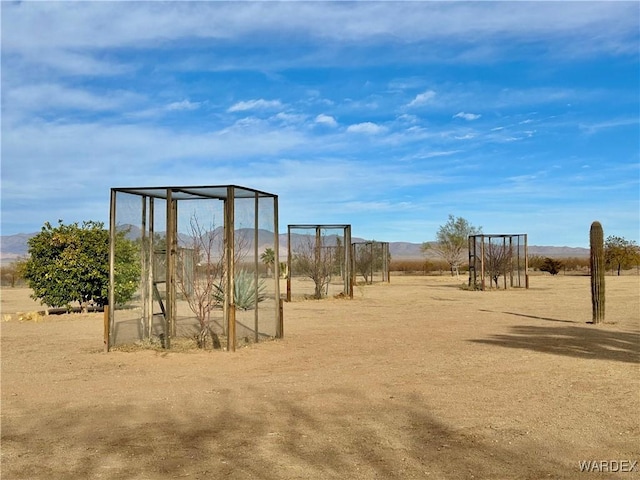 view of playground with a rural view