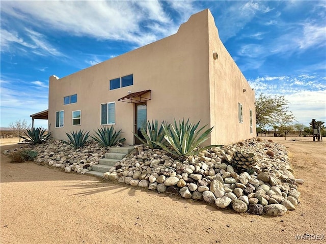 southwest-style home with stucco siding