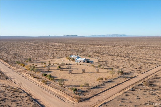 aerial view featuring view of desert and a rural view