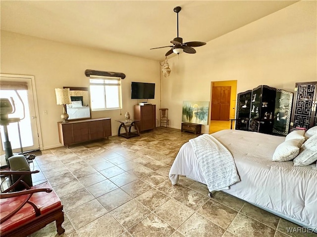 bedroom featuring high vaulted ceiling and a ceiling fan