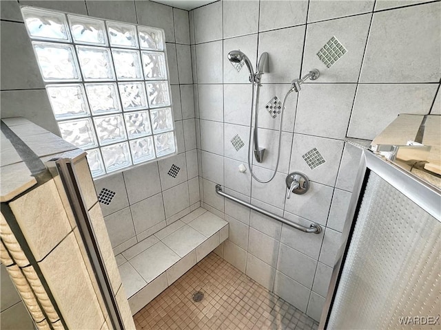 bathroom featuring a stall shower