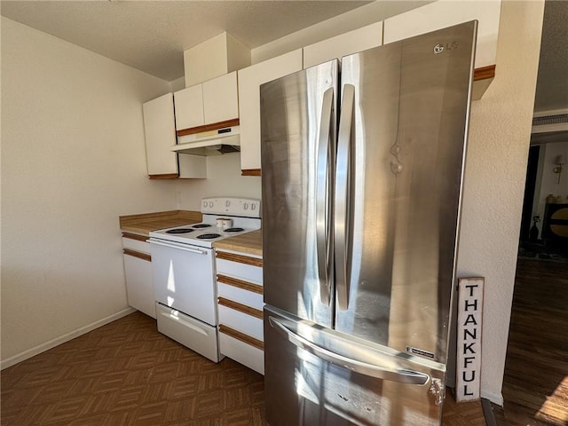 1189 Juanita Ln, Bullhead City, AZ 86442 - kitchen featuring freestanding refrigerator, white electric stove, under cabinet range hood, and white cabinets
