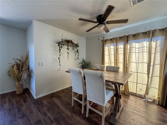 1189 Juanita Ln, Bullhead City, AZ 86442 - dining room featuring a textured ceiling, wood finished floors, and ceiling fan