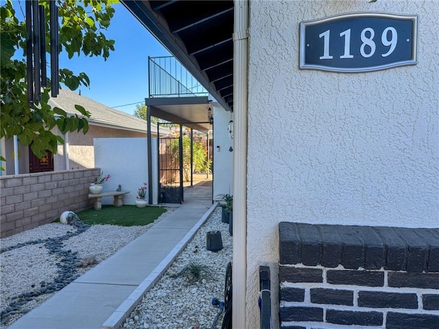 1189 Juanita Ln, Bullhead City, AZ 86442 - view of side of home featuring stucco siding