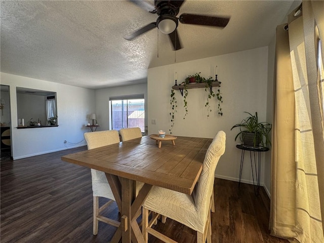 1189 Juanita Ln, Bullhead City, AZ 86442 - dining room with wood finished floors, a ceiling fan, and a textured ceiling