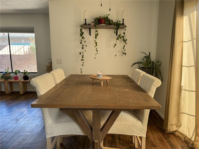 1189 Juanita Ln, Bullhead City, AZ 86442 - dining space with wood finished floors and baseboards