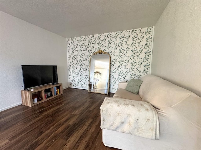 1189 Juanita Ln, Bullhead City, AZ 86442 - living area with wood finished floors, wallpapered walls, and arched walkways