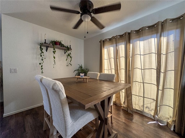1189 Juanita Ln, Bullhead City, AZ 86442 - dining room with ceiling fan and wood finished floors