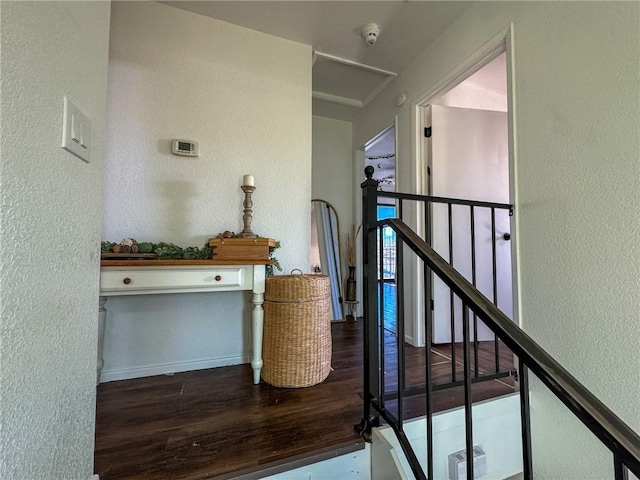 1189 Juanita Ln, Bullhead City, AZ 86442 - stairs with a textured wall, wood finished floors, and attic access