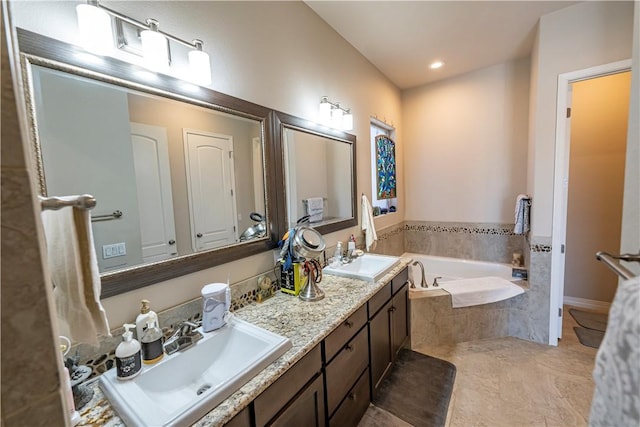 bathroom featuring a garden tub, double vanity, tile patterned flooring, and recessed lighting