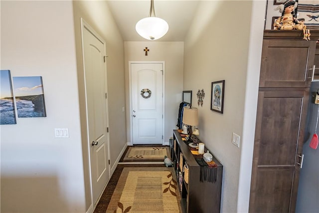 doorway with baseboards