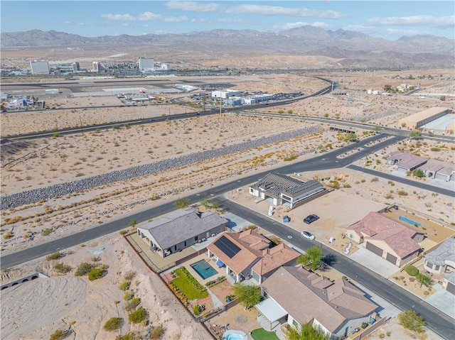 drone / aerial view of mountains and a desert landscape