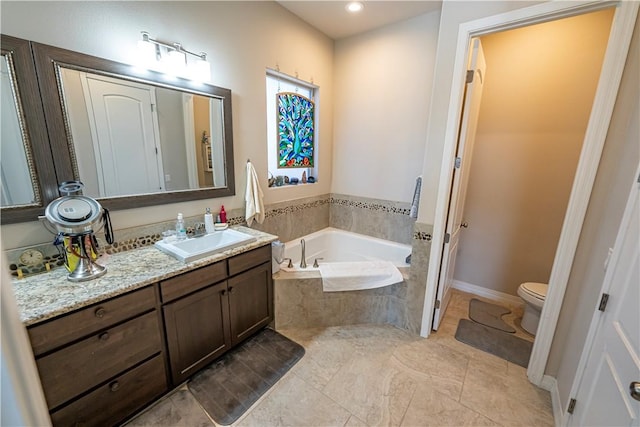 full bath with vanity, toilet, a bath, tile patterned floors, and recessed lighting