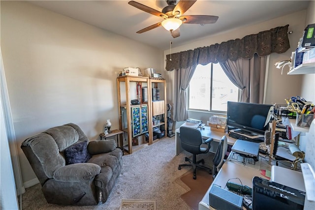home office featuring carpet and ceiling fan