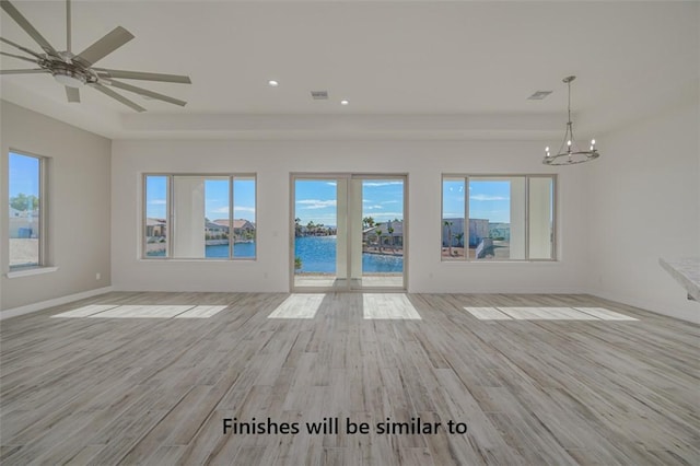 6175 S Los Lagos Bay Bay, Fort Mohave, AZ 86426 - unfurnished living room featuring light wood-style flooring, a water view, recessed lighting, plenty of natural light, and baseboards