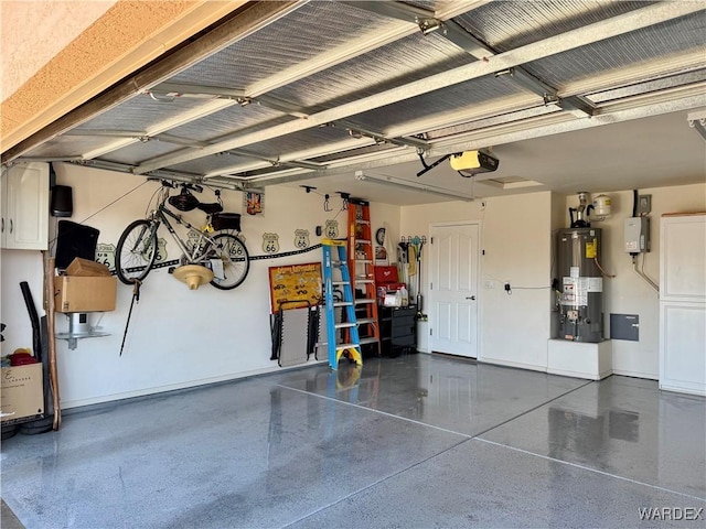 garage with a garage door opener, water heater, and baseboards