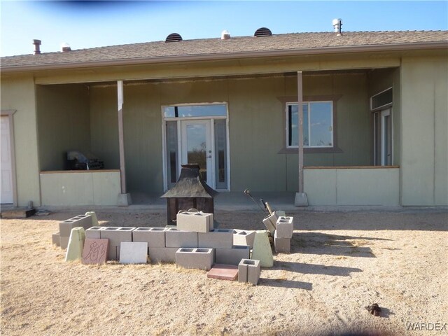 back of property featuring a patio area