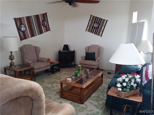 living area featuring ceiling fan