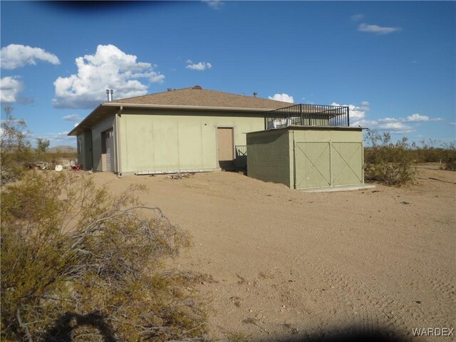 exterior space featuring an outdoor structure