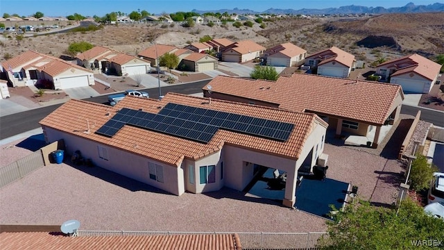 bird's eye view featuring a residential view and a mountain view