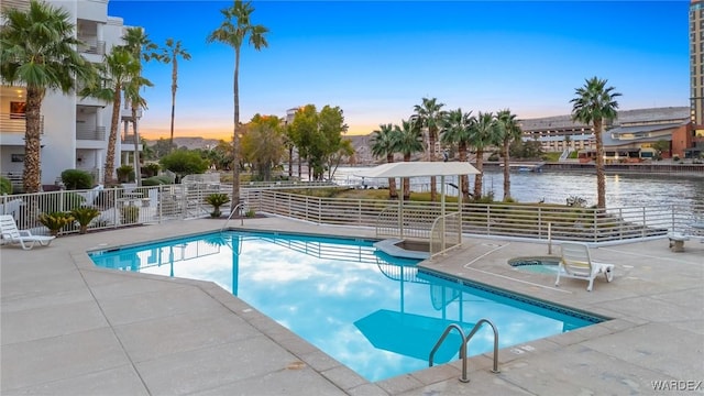 211 Moser Ave Unit 104, Bullhead City, AZ 86429 - community pool with a water view, a patio area, and fence