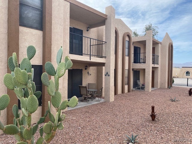 1280 Mohave Dr Unit 8A, Bullhead City, AZ 86442 - view of building exterior featuring fence