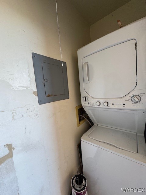 1280 Mohave Dr Unit 8A, Bullhead City, AZ 86442 - laundry room featuring electric panel, stacked washer and dryer, and laundry area
