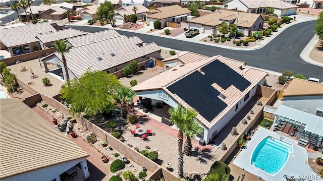 birds eye view of property with a residential view