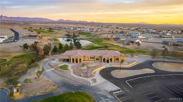 birds eye view of property featuring a mountain view