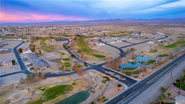 aerial view at dusk with a mountain view