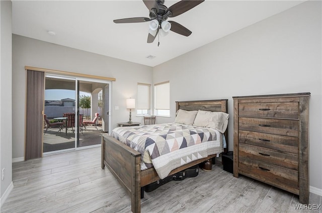 bedroom with light wood-type flooring, access to outside, baseboards, and ceiling fan