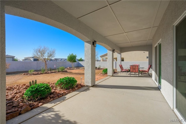 view of patio / terrace with outdoor dining space and a fenced backyard