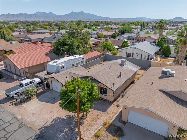 aerial view with a residential view and a mountain view