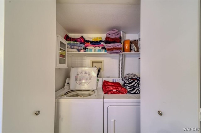laundry area with laundry area and independent washer and dryer