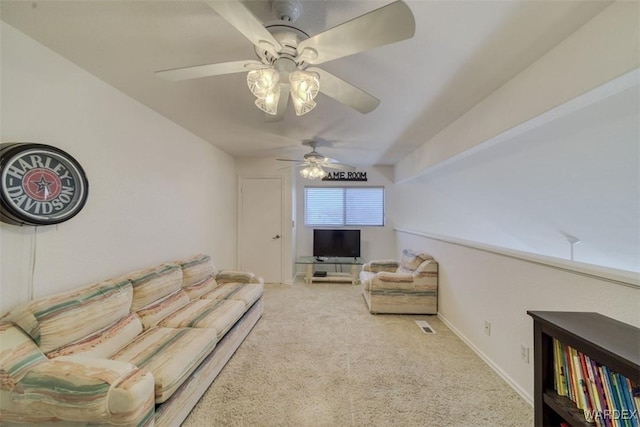 living room with carpet floors and ceiling fan