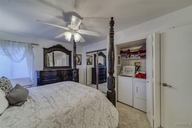 bedroom with a ceiling fan, light colored carpet, and washer and clothes dryer