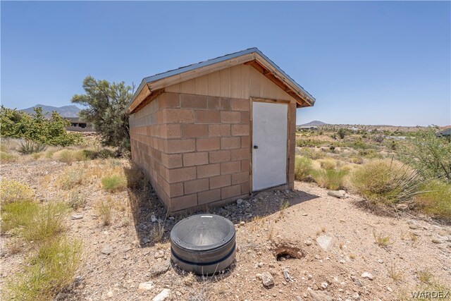 view of shed with a mountain view