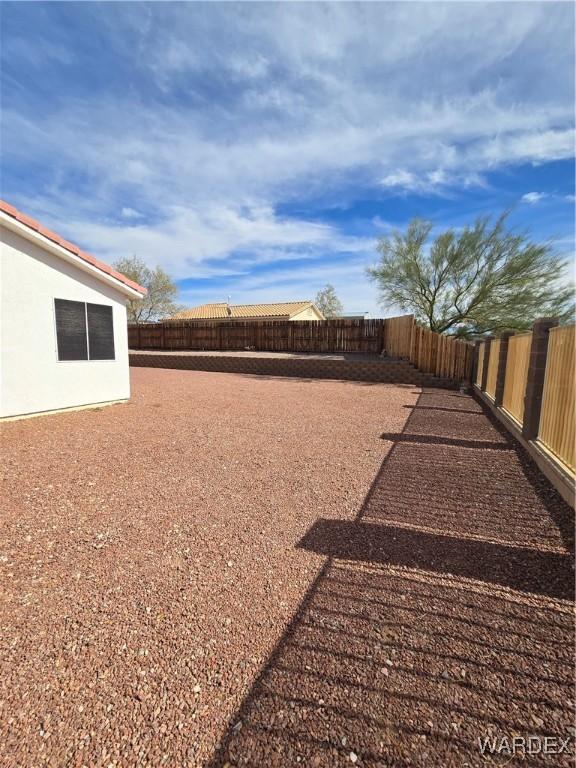 view of yard featuring a fenced backyard