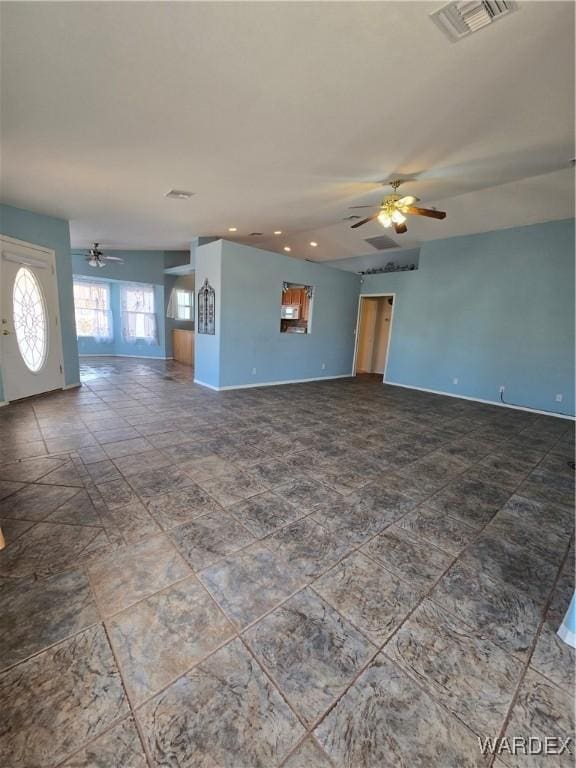 unfurnished living room featuring ceiling fan, recessed lighting, visible vents, and baseboards