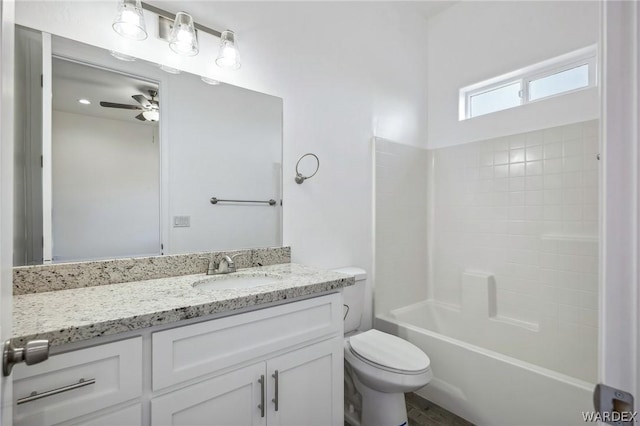 full bathroom with toilet, ceiling fan, bathtub / shower combination, and vanity