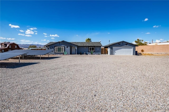 view of front facade with a garage and concrete driveway