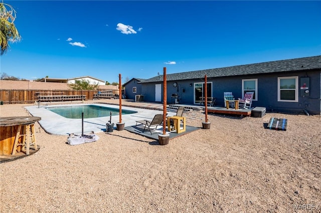 view of pool featuring a fenced in pool, a patio area, and fence