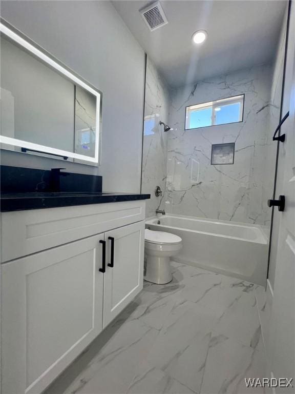 full bath with toilet, visible vents, bathing tub / shower combination, vanity, and marble finish floor