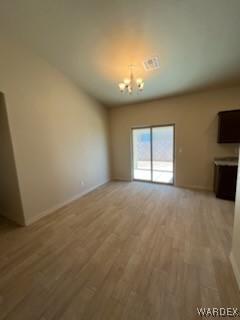 unfurnished living room with light wood-type flooring