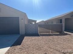 view of property exterior with a fenced front yard