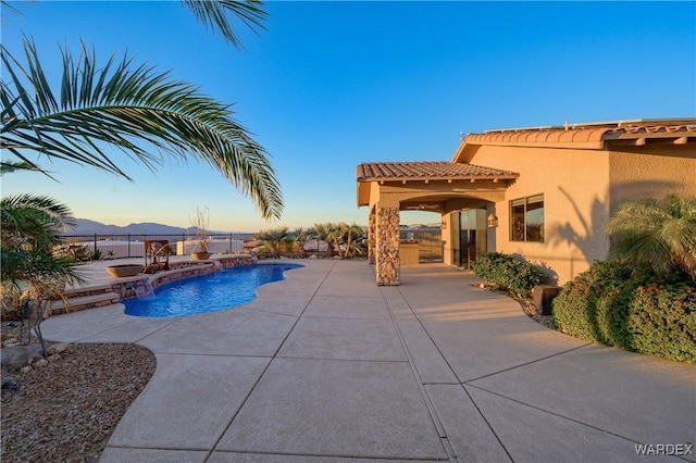 view of pool with a patio area and a fenced in pool