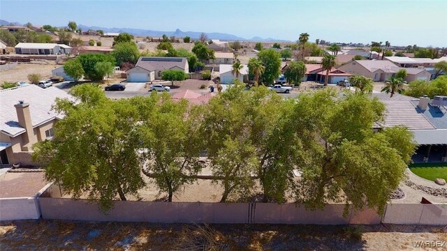 drone / aerial view with a residential view and a mountain view