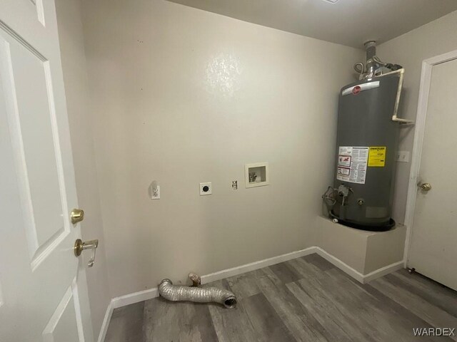 laundry area featuring dark wood-style floors, hookup for a washing machine, water heater, electric dryer hookup, and laundry area