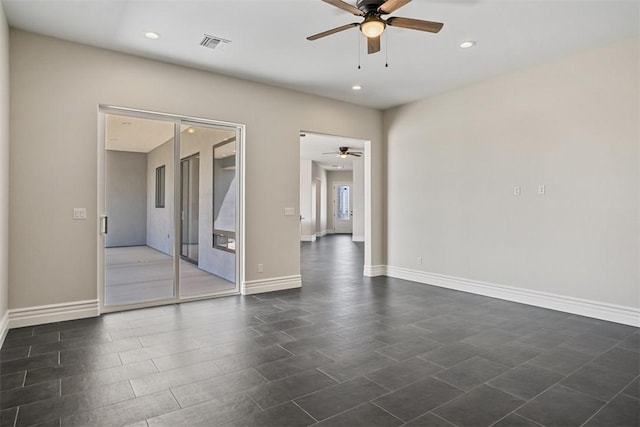 6068 S Greenhorn Dr, Fort Mohave, AZ 86426 - spare room with ceiling fan, baseboards, and recessed lighting